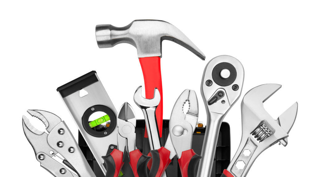 Image of multiple tools standing up out of a tool box.
